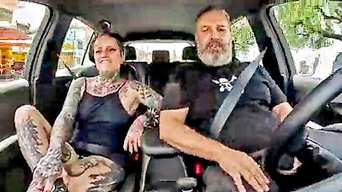 Tattooed Naty Loka smiles in car with bearded driver before anal ride