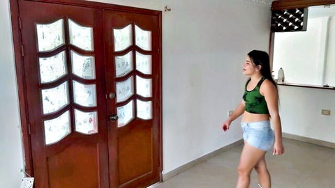 Sexy Asian neighbor in green tank top and tiny denim shorts teasing with big ass