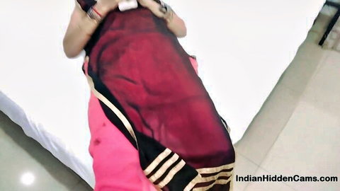 Indian Bhabhi lifting saree teasing curves in hotel