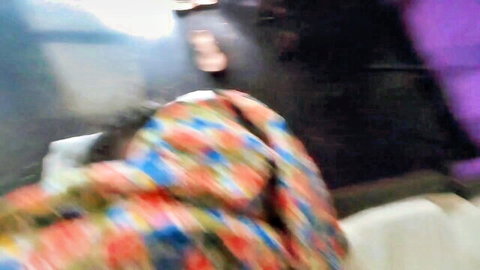 Blurry Sri Lankan teacher in colorful jacket, post-class encounter thumbnail