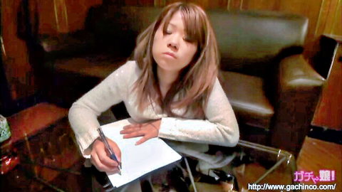 Japanese amateur housewife with big tits writing seductively in tight sweater on glass table