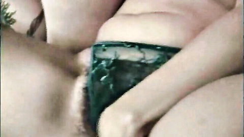Homemade close-up of amateur wife's hairy pussy and hand