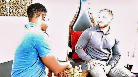 Bucky Wright and Jeremiah Cruz playing chess in interracial gay scene