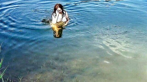 Hera Harding brunette swims topless in pond, wet see-through top