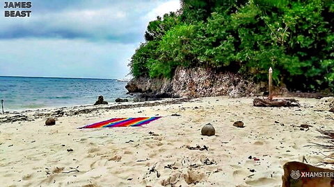 James Beast amateur Russian couple on nude beach setup, colorful blanket and tropical scene