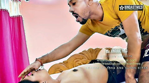 Indian man passionately kissing and groping topless Desi woman's big tits
