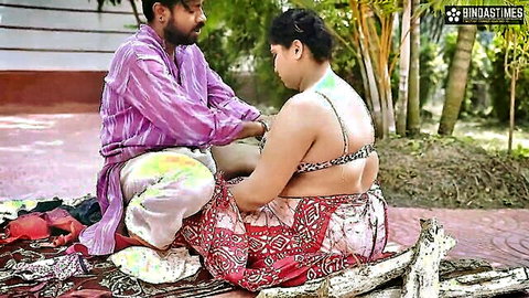 Thick Indian BBW MILF in black bra and wrap skirt gets intimate thigh touch from man outdoors