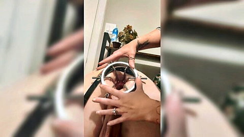 Extreme close-up pussy stretching with metal speculum by tattooed hands
