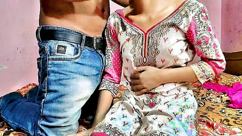 Punjabi girl in embroidered salwar kameez hugged by shirtless lover