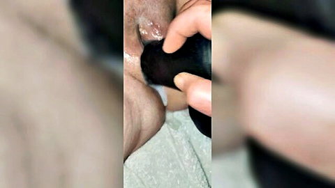 Close-up of huge black dildo deep in wet gaping pussy, creampie fun
