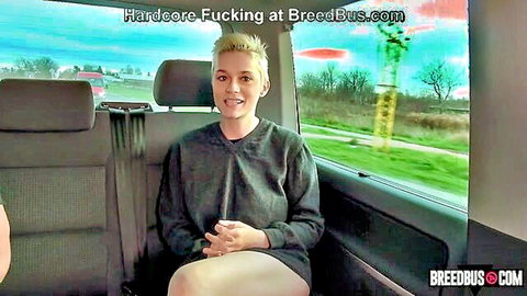 Mila Milan smiling in Breed Bus, short skirt, waiting for pickup