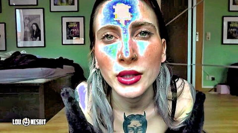 Lou Nesbit in seductive stepmom fantasy with glowing face paint and tattoos