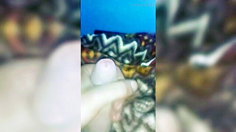Blurry close-up handjob on erect penis in amateur 2023 video
