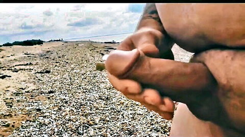 Bear with big fat belly stroking huge thick dick on beach
