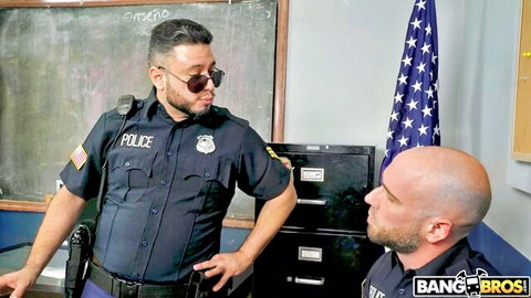 Two hot police officers in uniforms talking intensely in classroom Bang Bros
