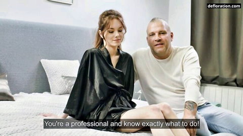 Anna Devito in black silk robe with professional lover in intimate defloration scene