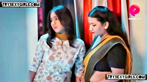 Two sexy Indian bhabhis in saree and salwar kameez, intimate chat scene