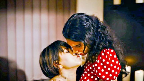Rashmii and Tina sharing a passionate lesbian kiss in polka dot dress