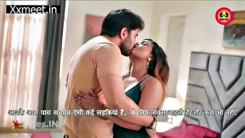 Passionate Indian couple kissing intimately in bed scene
