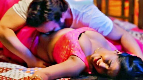 Desi beauty in pink saree exposed for passionate breast kiss