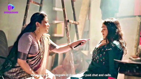 Indian MILF in purple saree teases young woman in green top, hot Besharams series