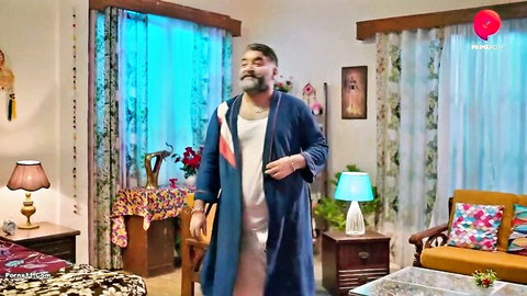 Mature Indian man in blue robe, standing pose from Hawas Hindi uncut webseries