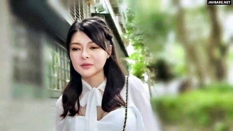 Cute Asian amateur babe in sexy white bow blouse smiling outdoors JAV