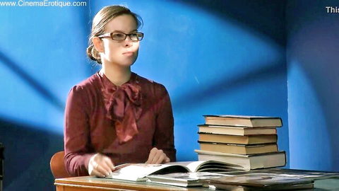 Nerdy brunette in glasses and red blouse at desk for deep throat fantasy
