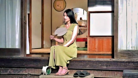 Suzu Honjo in sexy green dress, sitting elegantly, JAV wife gangbang preview