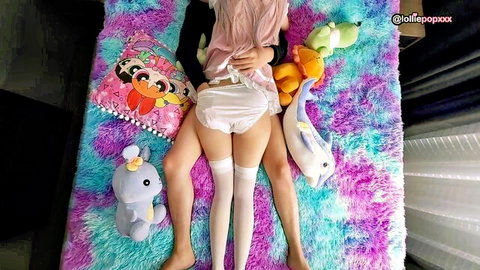 Petite girl in white panties and thigh-high stockings teases ass with stuffed animals