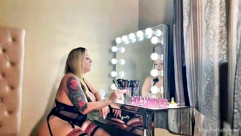 Julie Cash in sexy black lingerie posing at vanity, OnlyFans teaser