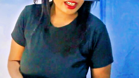 South Asian babe in tight top sticks tongue out with wide open red lips teasing blowjob