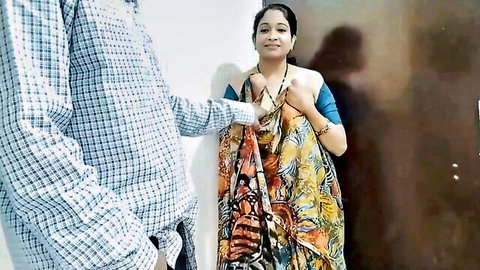 Indian housewife in colorful saree teases husband's erect cock with hand on pallu