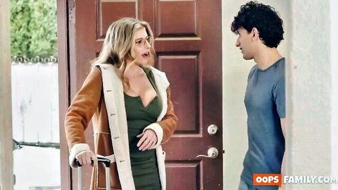 Cory Chase in sexy green dress and fur coat seducing man at door