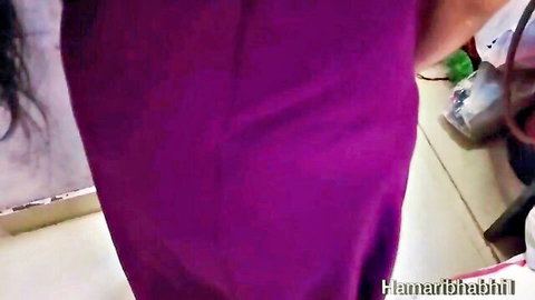 Indian Desi Bhabhi Devi in tight purple dress teasing