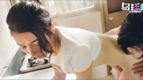 Asian woman in cropped white shirt bent over for intense doggy style pounding