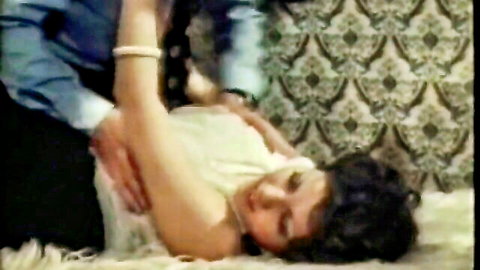 Vintage German couple in intimate bed scene from Bettpiraten Tabu Film 62