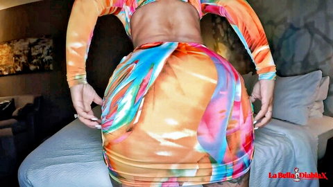 Thick Latina babe with massive ass bends over bed grabbing and spreading cheeks in colorful bodysuit