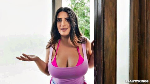 Sarah Arabic in pink bikini top, busty Arab beauty smiling outdoors