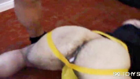 Ace Stone bent over in doggy anal scene with yellow strap, Load Collector by Sketchy Sex