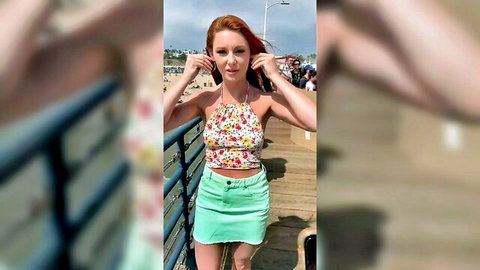 Lacy Lennon in floral halter top and green mini skirt on pier
