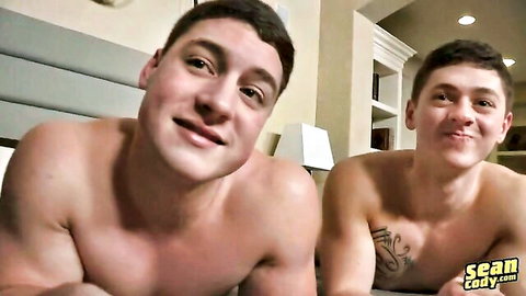 Nate Love and Clark Campbell shirtless twink embrace in bed
