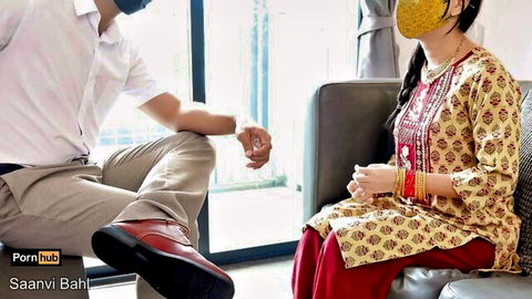Saanvi Bahl in traditional Indian dress with masked boss in intimate seated pose
