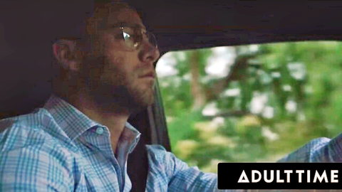 Pensive man in glasses driving car, thoughtful expression, AdultTime thumbnail