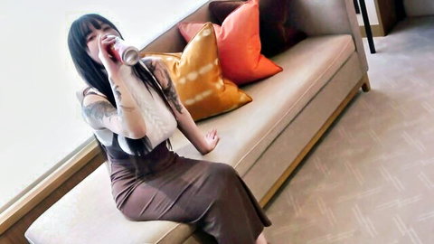 Tattooed Japanese big tits onee-san drinking seductively in off-shot