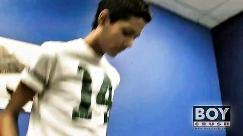 Cute twink boy in white numbered 14 t-shirt from Boy Crush gay studio
