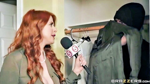 Buxom redhead MILF reporter in open blazer interviewing man in closet