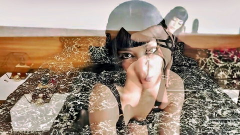 Seductive Asian woman with bangs and tongue out in artistic desert double exposure overlay
