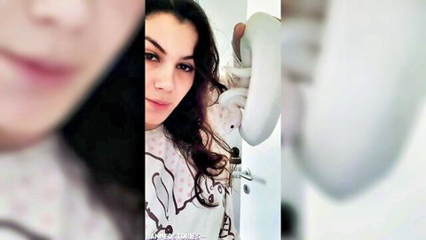 Valentina Nappi smiling in pink top, sexy bathroom selfie