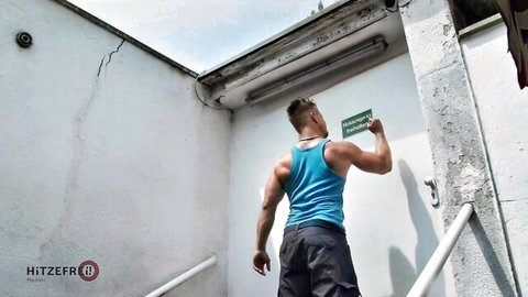 Muscular man in tank top nailing with sexy Austrian mature outdoors